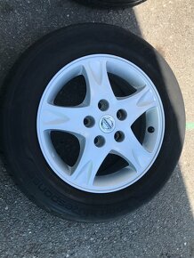 Alu kola Nissan Almera Tino 195/65 R15 - 11