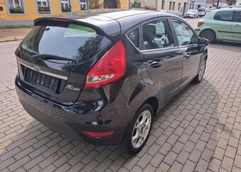 Ford Fiesta 1,4 TDCI Titanium nafta manuál 52 kw - 11