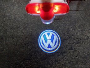 LED projektory s logom ŠKODA a VW. - 11