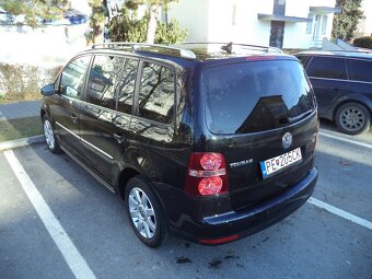 Volkswagen Touran 1.9 TDI Highline DSG automat 2009 - 11