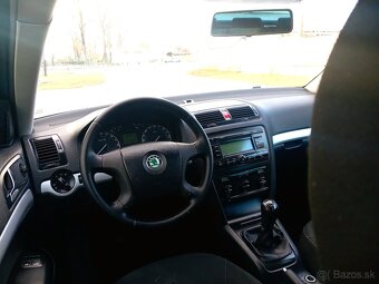 ŠKODA OCTAVIA COMBI 1.9TDI ELEGANCE 2008. - 11