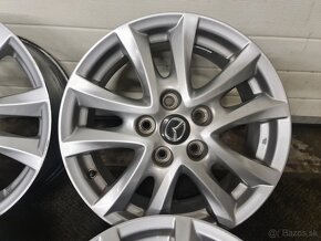 Mazda 5x114,3 R16 alu. - 12