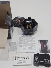 G SHOCK CASIO GOLD/BLACK - 12