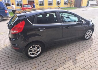 Ford Fiesta 1,4 TDCI Titanium nafta manuál 52 kw - 12