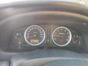 Nissan almera 1.5 benzin 2004 - 12