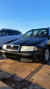 Skoda octavia 1.6 .75 kW benzin - 12