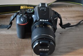 Nikon D5600 wifi BT - dotyk. dis. - VR objektiv AF-P 1tis.sn - 12