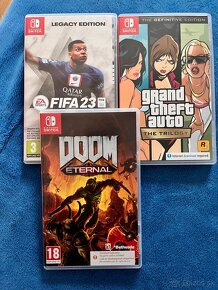 Nintendo Switch (komplet balenie + gta trilogy, fifa23, doom - 12