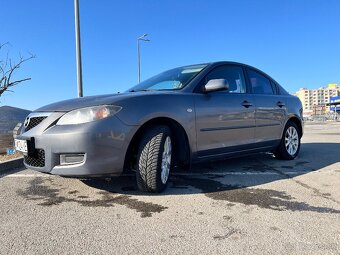 Mazda 3 sedan 1.6 benzin 2008 - 13