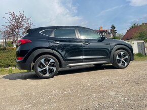 Hyundai Tucson 4x4 benzin 130kW - 13