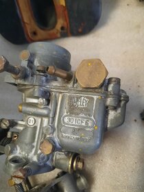 Motor a prevodovka Fiat 600,rámčeky predných svetiel - 13