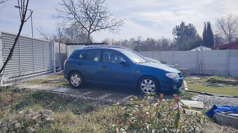 Nissan Almera 1.8 benzin 2001 - 13