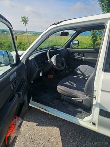 Pickup Mitsubishi L200 2002 2.5 l Diesel 85 kW nova stk,ek - 13