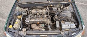 Nissan Almera N16 1,5i - 14