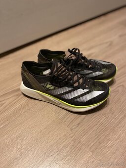 Karbónové bežecké tenisky Adidas adizero takumi sen 10 - 14