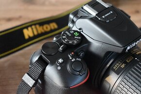 Nikon D5600 wifi BT - dotyk. dis. - VR objektiv AF-P 1tis.sn - 15