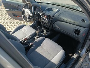 Nissan Almera N16, r.v. 2006 - 16