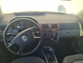 Skoda Fabia 1 2004 burana z predu - 17