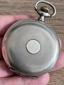 Panceřové tříplaštové stříbrné kapesní hodiny OMEGA