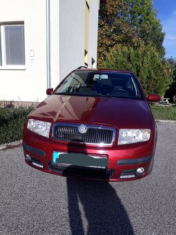 Fabia combi 2007 červený šíp