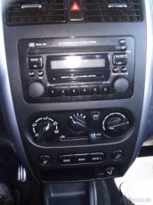 Suzuki Jimny na originál rádio ramček