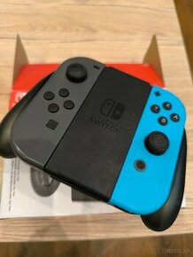 Nintendo ovládač Joy-Con + Charging Grip