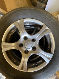 Alu disky s pneu 215/65r 15