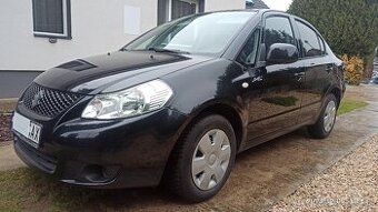 SUZUKI SX4  1,6 i  sedan