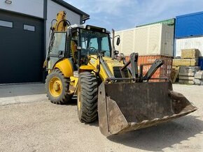 Traktorbager new holland 115b