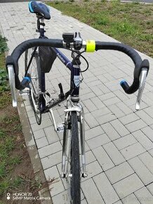 Cestný bicykel Peleton