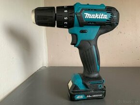 Makita HP333D Aku príklepový skrutkovač Li-ion CXT - 1