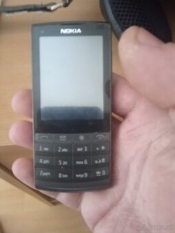 Nokia x302