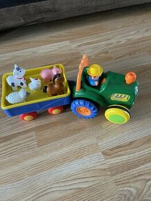 Traktor s farmárom a zvieratkami Happy Baby
