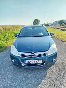 Opel Astra h kombi 1,6 77kw benzín - 1