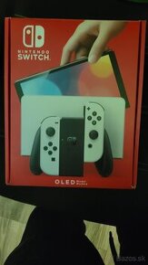 Predám Nintendo Switch Oled, obal a hry.