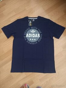 panske tricko adidas,znak