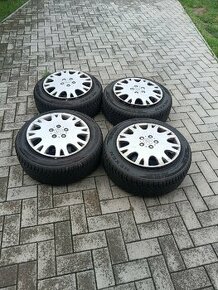 Zimné pneumatiky komplety z puklicami 205/55 R 16