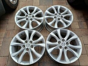 org.hlinikové disky Mazda---7Jx17-ET-52,5--5x114,3