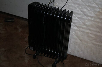 Olejovy radiator malo pouzivany