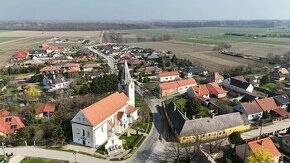 Novostavba malebného domčeka na priestrannom pozemku.Rajka