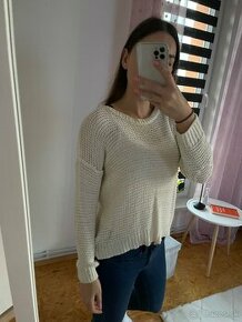 Biely sveter