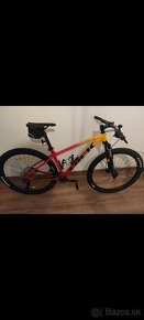 Bicykel Trek Marlin 7 Marigold to Radioactive Red Fade E 202