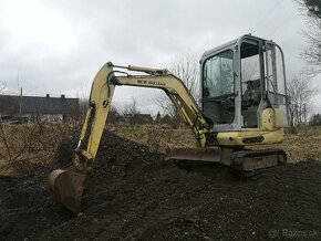 New Holland E 18 Kobelco Pásový bagr minibagr Pluh