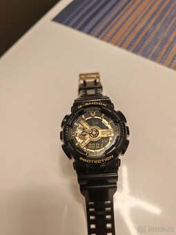 Kombinované športové hodinky Casio GA 110GB-1A G-SHOCK