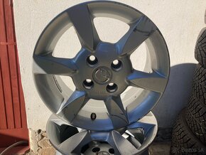 4x 100 R14 hlinikove disky 4ks original mazda