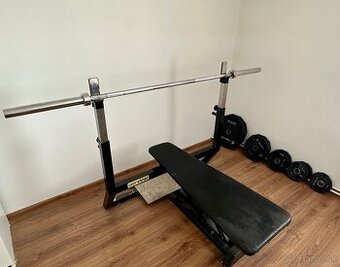 Kohi bench press lavica, olympijskú tyč, kotúče.