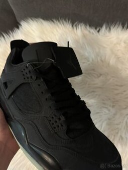 Jordan 4 black kaws