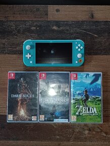 Nintendo Switch lite + 128gb micro SD + hry