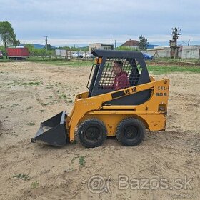 Smykový nakladač- Bobcat TCM 603 - 1