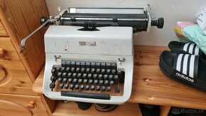 Darujem písací stroj
